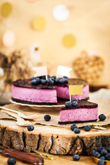 Fototapeta na wymiar Delicious homemade blueberry cheesecake decorated with jelly