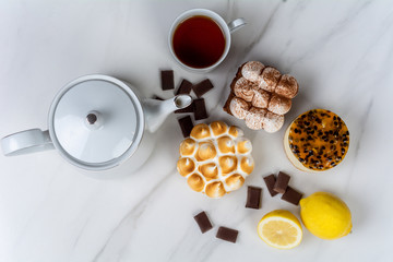 Mini chocolate, lemon pie and passion fruit cake.