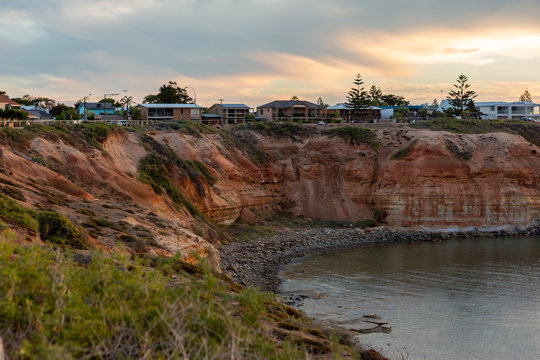 Sunset over over the cliffs at the Onkaparinga River Mouth at Port Noarlunga South Australia on  7th March 2019