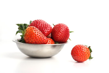 bowl of strawberries isolated on white background