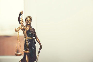 justice lady on desk