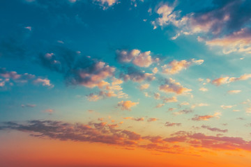 Fototapeta premium Yellow Blue Sunrise Sky With Sunlight