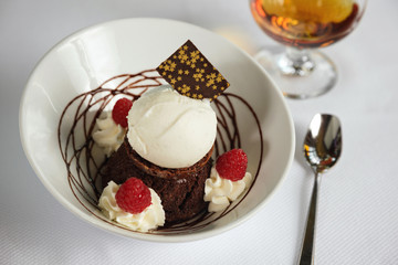 restaurant dessert - ice cream and brownie sundae with brandy snifter