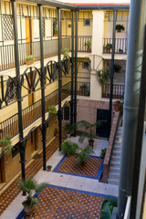 Typical andalusian courtyard In Seville, Spain.