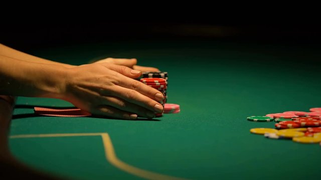 Gambler increasing bet despite losing combination in poker, bluffing, bad luck