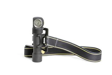 Head lamp flashlight with light beam studio shot