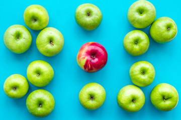 green apples for organic summer food pattern on blue background top view