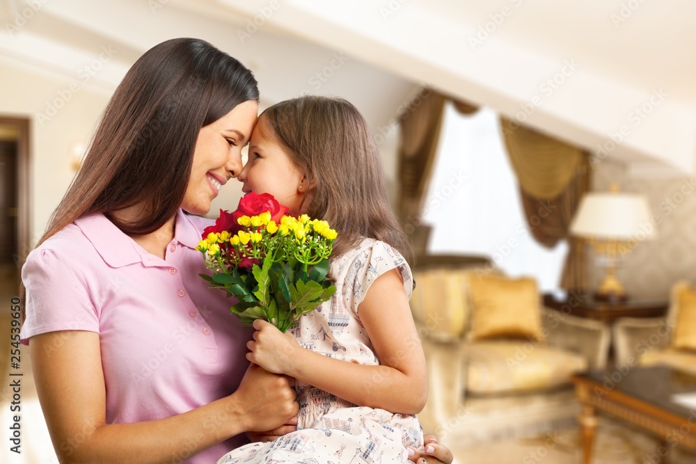 Sticker Portrait of happy mother and daughter holding  flowers