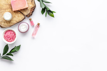 homemade spa with woman cosmetics on white background top view copyspace