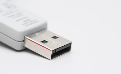 White usb stick macro shot isolated on white background. Copy space