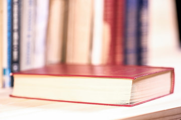 image of a book lying on the shelf