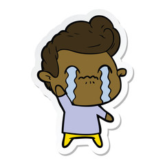 sticker of a cartoon man crying