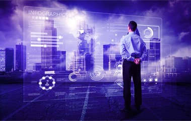 Man looking at user interface over cityscape background