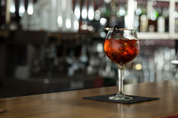 Looks refreshing. Clouseup shot of cocktail glass full of ice and drink.