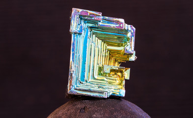 A bismuth crystal photographed up close in high detail.