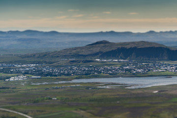 Tilt shift photography of city as seen from mountain