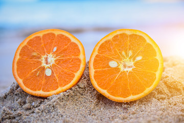 Orange is on beach sea view background,Summer holiday concept