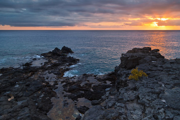 rocks and sea in sunset time