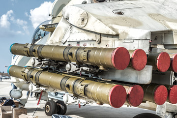 Rocket launcher under wing of military helicopter
