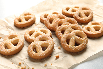 Paper and tasty Danish butter cookies on table