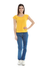 Obraz premium Beautiful young woman in stylish clothes on white background