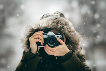 Close Up Of Woman Holding an Analog Camera