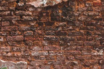 Oldest brick wall with plaster background. Old vintage texture with copy space