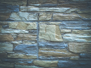 Facade tiles imitating stone texture in retro stile.