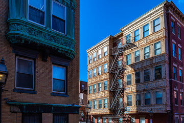 Boston, USA- March 01, 2019: picturesque Boston Streets with brick tiles and buildings. Boston is Capital city of state Massachusetts, United states of America