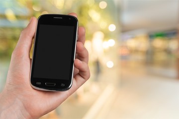 Hand holding smartphone  concept