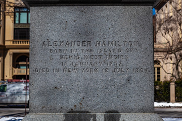 Boston, USA- March 01, 2019: Statue of Alexander Hamilton In the direction of his lifelong friend, The George Washington Statue, at Entrance in Boston Public Garden