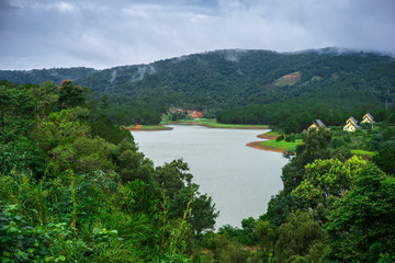 Amazing, beautiful panorama of Tuyen Lam lake of Dalat city, fresh air, group of villa among forest, impression shape of hill and mountain, lake alternate jungle make wonderful countryside for travel