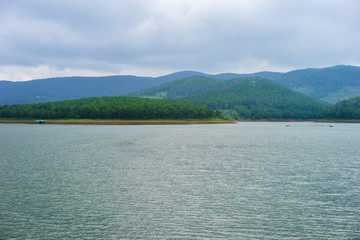 Amazing, beautiful panorama of Tuyen Lam lake of Dalat city, fresh air, group of villa among forest, impression shape of hill and mountain, lake alternate jungle make wonderful countryside for travel