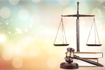 Law scales on table background. Symbol of justice