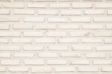 Cream colors and white brick wall art concrete or stone texture background.
