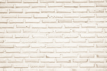 Cream colors and white brick wall art concrete or stone texture background.