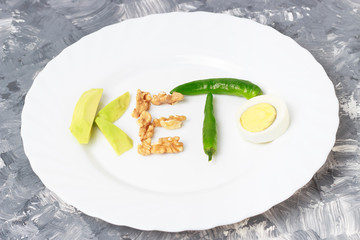 Inscription Keto made of nuts, eggs and avocado. Ketogenic diet concept