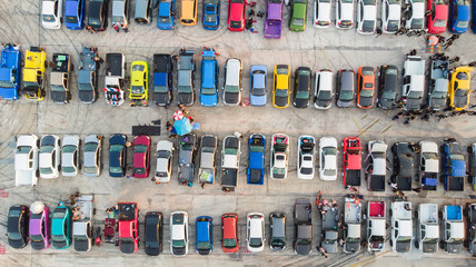Aerial view car show on cement car parking.