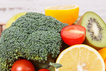 Natural fruits and vegetables in wooden box. Nutritious food containing minerals and vitamins