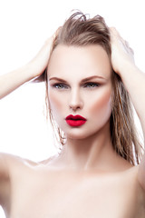Fototapeta na wymiar Fashion look of glamor portrait of beautiful sexy stylish Caucasian young model woman with red lips bright makeup, with perfect clean skin. White background. Copy space