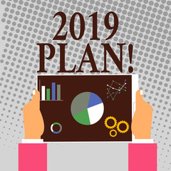 Writing note showing 2019 Plan. Business concept for Challenging Ideas Goals for New Year Motivation to Start