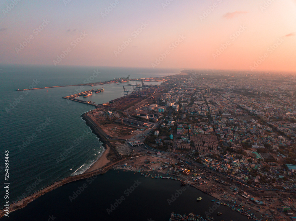 Wall mural view of city at sunset