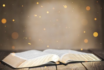 Holy bible book on wooden table