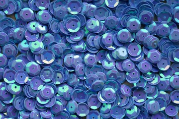 Sequins macro background.holographic blue  sequins macro.ridescent fabric.Scales background. fabric...