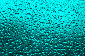 turquoise background with water droplets close-up. Horizontal photo