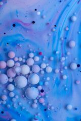 abstract background of colored drops of water and oil