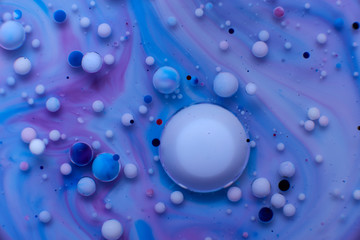 abstract background of colored drops of water and oil