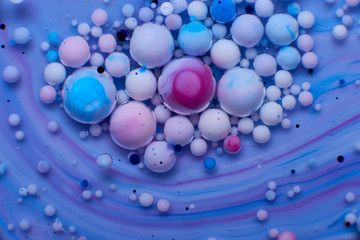 abstract background of stains and paint bubbles in liquid