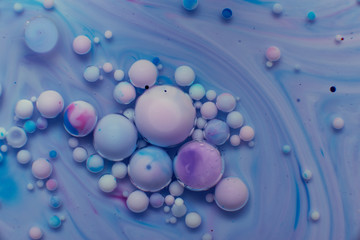 abstract background of stains and paint bubbles in liquid