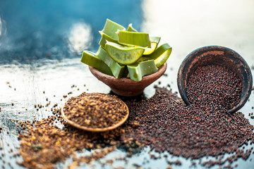 Best hair remedy to reduce hair fall and   effective exfoliation of skin on wooden surface i.e....
